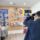camera shooting video of wall display